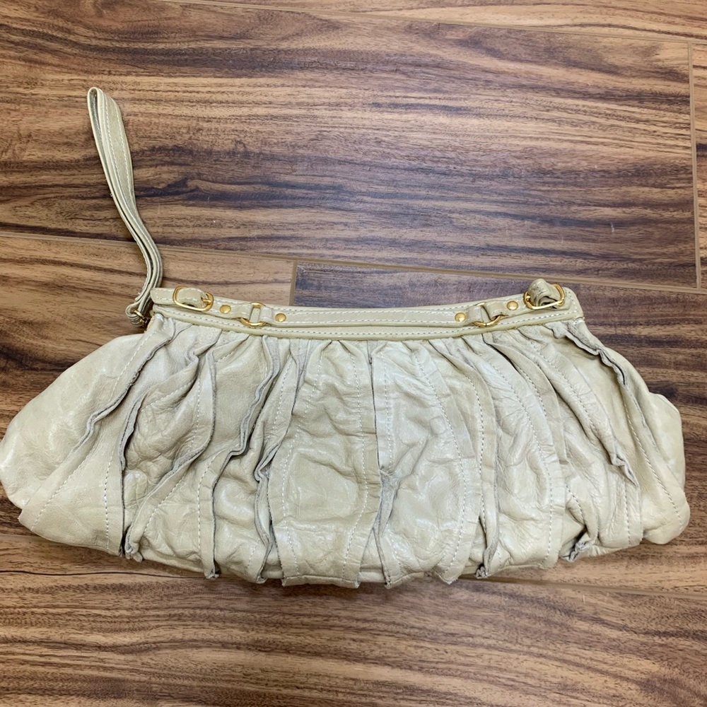 Bebe beige leather clutch purse, like new